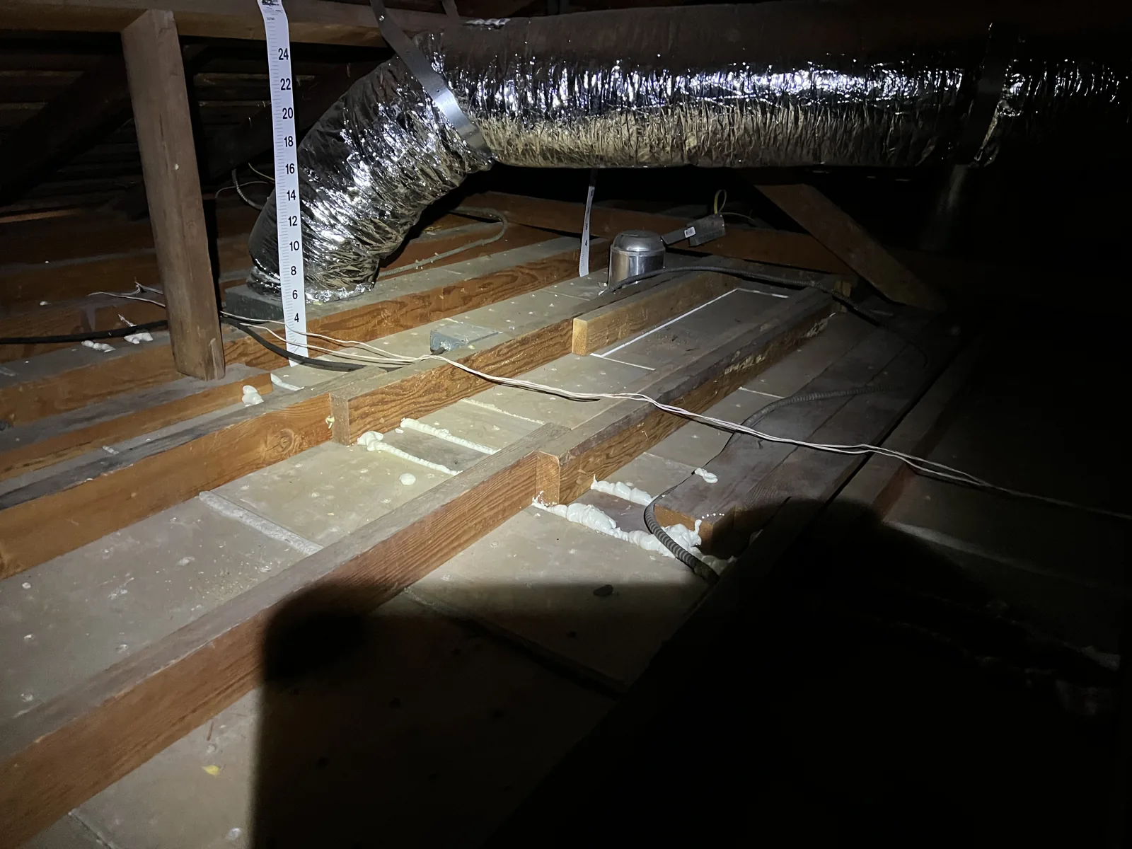 Attic insulation being brought up to depth